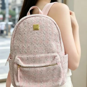 Mochila rosa de tweed con lentejuelas