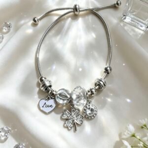 PULSERA PLATEADA CON DIJER DE TREBOL DE CUATRO HOJAS Y CRISTAL CORAZON LILA GGL-0001