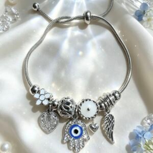 PULSERA PLATEADA CON DIJER DE MANO DE FATIMA OJO MALVADO Y ALA DE ANGEL AZUL GGL-0001
