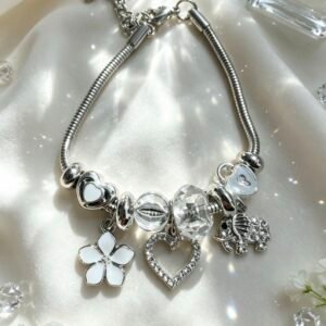 PULSERA PLATEADA CON DIJER DE CORAZON HUECO ELEFANTE CON BRILLANTE FLOR BLANCO GGL-0002