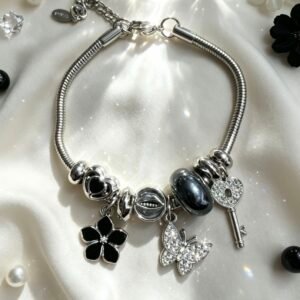 PULSERA PLATEADA CON DIJER DE LLAVE MARIPOSA CON BRILLANTE FLOR NEGRO GGL-0002