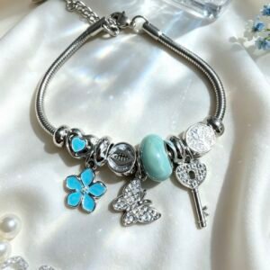 PULSERA PLATEADA CON DIJER DE LLAVE MARIPOSA CON BRILLANTE FLOR TURQUESA GGL-0002