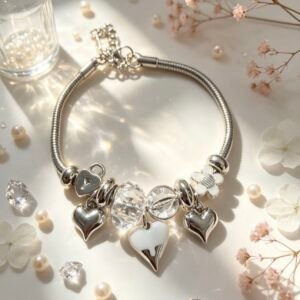 PULSERA PLATEADA CON DIJES DE MULTIPLES CORAZONES METALICOS BLANCO GGL-0002