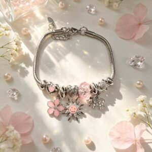PULSERA PLATEADA CON DIJER DE ELEFANTE SOL SONRIENTE FLOR ROSA GGL-0002