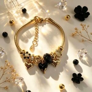 PULSERA DORADA CON DIJER DE CORAZON EN FORMA DE V NEGRA GGL-0003
