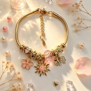 PULSERA DORADA CON DIJER DE SOL SONRIENTE ELEFANTE FLOR ROSA GGL-0003