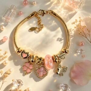 PULSERA DORADA CON DIJER DE MARIPOSA TREBOL DE CUATRO HOJAS ROSA GGL-0003