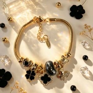 PULSERA DORADA CON DIJER DE MARIPOSA TREBOL DE CUATRO HOJAS NEGRA GGL-0003