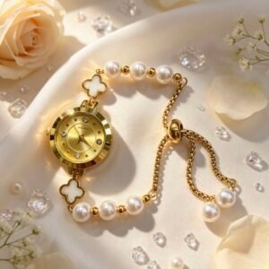 RELOJ PULSERA DORADO CON PERLAS DIJES DE TREBOL Y ESFERA MS-3069