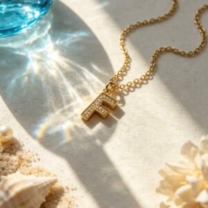 COLLAR LETRA DORADO F 2155