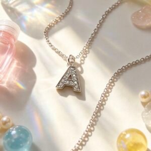 COLLAR LETRA PLATEADO A 2155